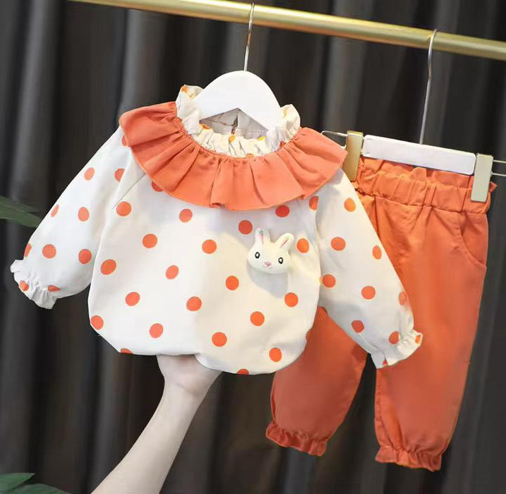 Girls trouser and big dotted top
